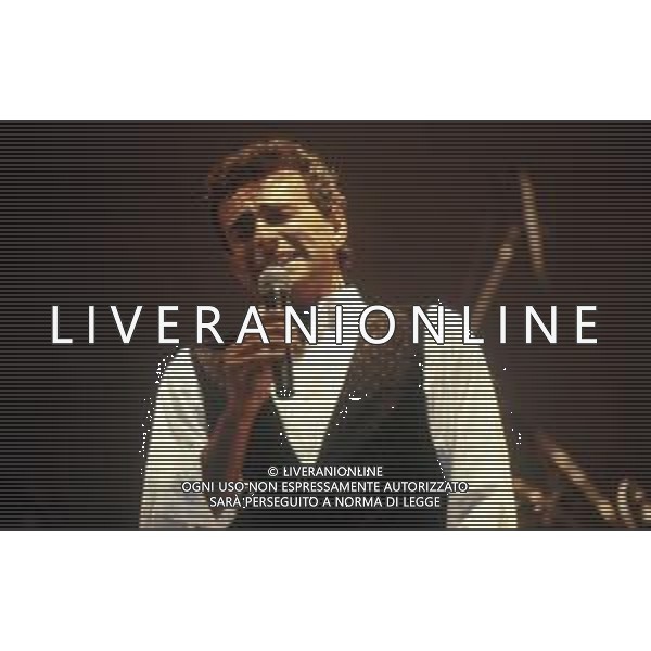 Dia-RETROSPETTIVA PINO D\'ANGIO\' CANTANTE NELLA FOTO PINO D\'ANGIO\' NELL\'ANNO 1990 AG ALDO LIVERANI SAS
