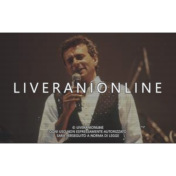 Dia-RETROSPETTIVA PINO D\'ANGIO\' CANTANTE NELLA FOTO PINO D\'ANGIO\' NELL\'ANNO 1990 AG ALDO LIVERANI SAS