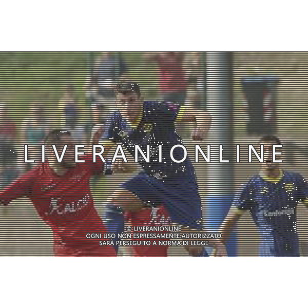 Giangiacomo Magnani of Hellas Verona heads the ball during Hellas Verona FC vs Top 22 Dilettanti Verona, 1° Test Match, at Centro Sportivo \'La Pineta\' on Folgaria (TN), on July 17, 2024. (Photo by Davide Casentini)/AGENZIA ALDO LIVERANI SAS