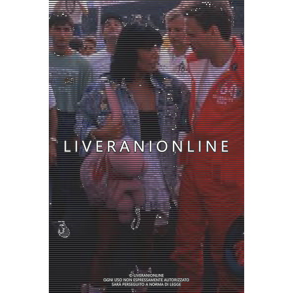 DIAP-RETROSPETTIVA LOREDANA BERTE\' CANTENTE NELLA FOTO LOREDANA BERTE\' CON BJORN BORG A MONZA NELL\'ANNO 1988 ALLA COMPETIZIONE AUTOMOBILISTICA “ALFA 164 CELEBRITY RACE“ FOTO CONTROLUCE-AG ALDO LIVERANI SAS