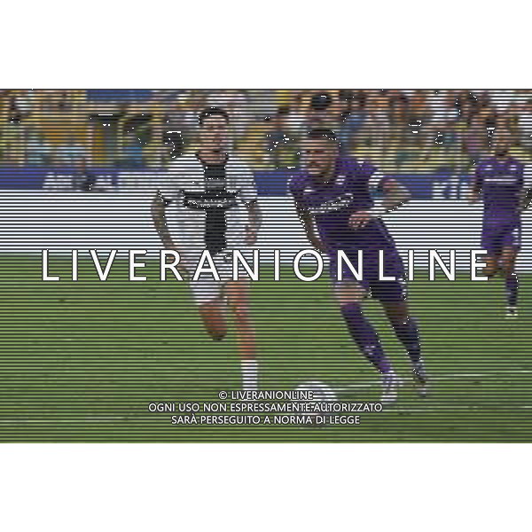 Cristiano Biraghi of ACF Fiorentina. competes for the ball with Dennis Man of Parma AC during Parma FC vs ACF Fiorentina, 1° Serie A Enilive 2024-25 game at Ennio Tardini Stadium in Parma (PR), Italy, on August 17, 2024. (Photo by Davide Casentini)/AGENZIA ALDO LIVERANI SAS