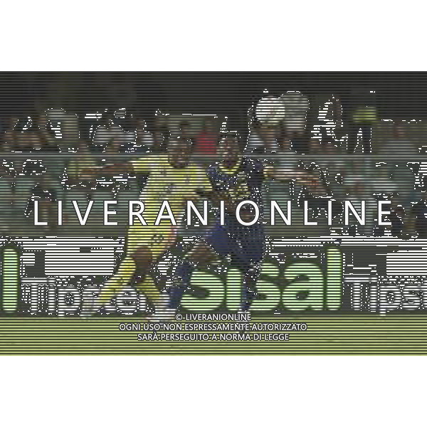 Pierre Kalulu of Juventus FC competes for the ball with Faride Alidou of Hellas Verona FC during Hellas Verona FC vs Juventus FC, 2° Serie A Enilive 2024-25 game at Marcantonio Bentegodi Stadium in Verona (VR), Italy, on August 26, 2024. (Photo by Davide Casentini)/ AGENZIA ALDO LIVERANI SAS