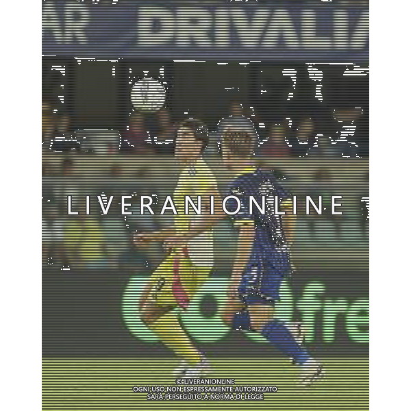 Dusan Vlahovic of Juventus FC battle for the ball with Martin Frese of Hellas Verona FC during Hellas Verona FC vs Juventus FC, 2° Serie A Enilive 2024-25 game at Marcantonio Bentegodi Stadium in Verona (VR), Italy, on August 26, 2024. (Photo by Davide Casentini)/AGENZIA ALDO LIVERANI SAS