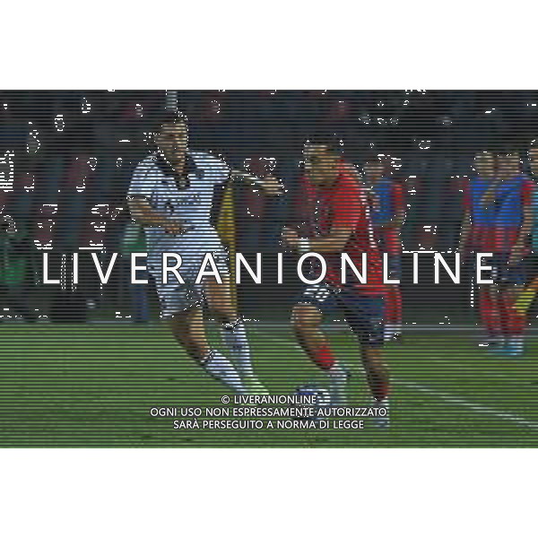 Cosenza\'s Andrea Rizzo Pinna in action against Spezia\'s Filippo Bandinelli during the italian soccer Serie B match Cosenza Calcio vs Spezia Calcio at the San Vito-Marulla stadium in Cosenza, Italy on August 28, 2024 FOTO ANDREA ROSITO-AG ALDO LIVERANI SAS