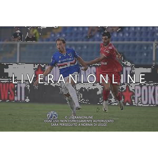 TVRG Sampdoria vs Bari nella foto Nikola Sekulov (Sampdoria) trattenuto da Nunzio Lella (Bari) Genova 31-08-2024 Stadio Luigi Ferraris - Marassi Campionato Serie BKT - 4a giornata foto Roberto Garavaglia/Agenzia Aldo Liverani sas