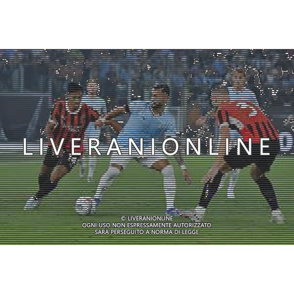 Serie A EniLive 2024-2025 Stadio Olimpico di Roma Nella foto: Valentin Castellanos contrastato da Tijjani Reijnders e Strahinja Pavlovic -Lazio vs Milan - Campionato Serie A Enilive 3a giornata 31-08-2024 ©Andrea Rosito / AGENZIA ALDO LIVERANI SAS