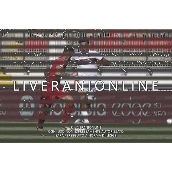 Dan Ndoye of Bologna FC play the ball against Pedro Pereira of AC Monza during AC Monza vs Bologna BFC, 5° Serie A Enilive 2024-25 game at U-Power stadium in Monza (MB), Italy, on September 22, 2024. (Photo by Davide Casentini)/AGENZIA ALDO LIVERANI SAS