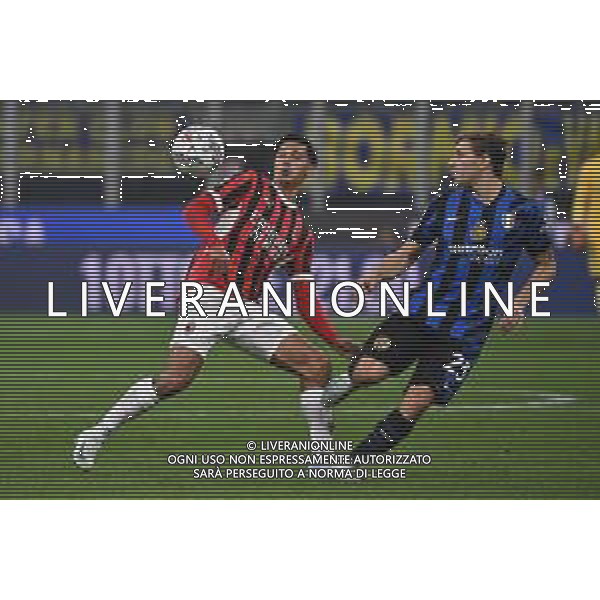 Inter vs Milan nella foto Tijjani Reijnders (Milan) e Nicolò Barella (Inter) Milano 22-09-2024 Stadio Giuseppe Meazza - San Siro Campionato Serie A Enilive - 5a giornata foto Roberto Garavaglia/Agenzia Aldo Liverani sas/AGENZIA ALDO LIVERANI SAS