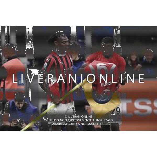 Inter vs Milan nella foto Rafael Leao (Milan) e Youssouf Fofana (Milan) a fine gara coprono lo stemma dell\'Inter con una maglia del Milan Milano 22-09-2024 Stadio Giuseppe Meazza - San Siro Campionato Serie A Enilive - 5a giornata foto Roberto Garavaglia/Agenzia Aldo Liverani sas/AGENZIA ALDO LIVERANI SAS