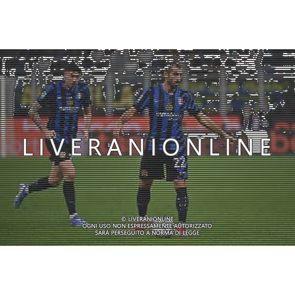 Inter vs Milan nella foto Henrikh Mkhitaryan (Inter) e sulla SX Alessandro Bastoni (Inter) Milano 22-09-2024 Stadio Giuseppe Meazza - San Siro Campionato Serie A Enilive - 5a giornata foto Roberto Garavaglia/Agenzia Aldo Liverani sas/AGENZIA ALDO LIVERANI SAS