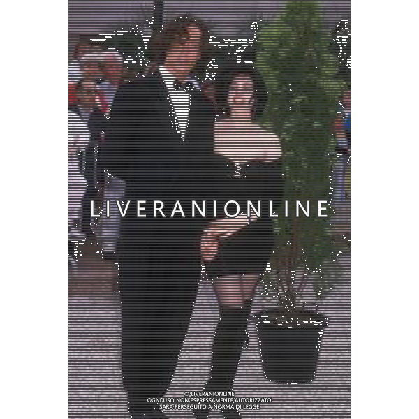 DIAP-RETROSPETTIVA RUPERT EVERETT ATTORE NELLA FOTO RUPERT EVERETT E BEATRICE DALLE A CANNES NELL\'ANNO 1988 AG ALDO LIVERANI SAS