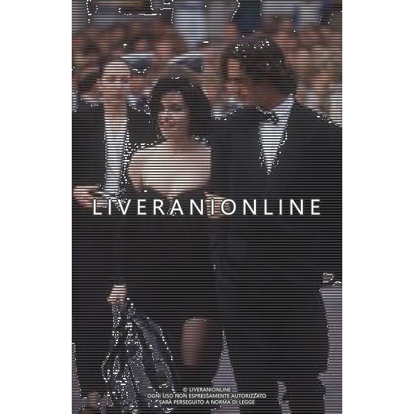 DIAP-RETROSPETTIVA RUPERT EVERETT ATTORE NELLA FOTO RUPERT EVERETT E BEATRICE DALLE A CANNES NELL\'ANNO 1988 AG ALDO LIVERANI SAS
