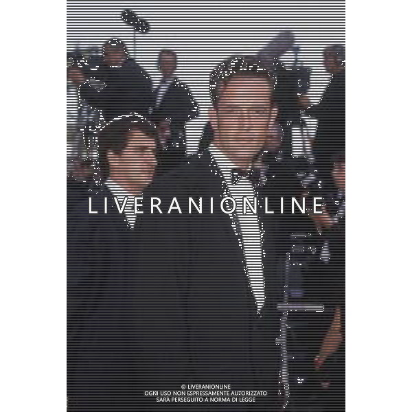 DIAP-RETROSPETTIVA RUPERT EVERETT ATTORE NELLA FOTO RUPERT EVERETT E BEATRICE DALLE A CANNES NELL\'ANNO 1988 AG ALDO LIVERANI SAS