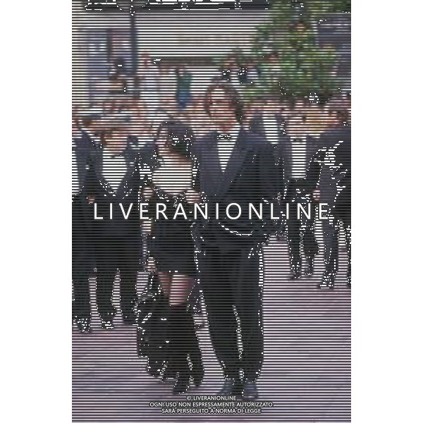 DIAP-RETROSPETTIVA RUPERT EVERETT ATTORE NELLA FOTO RUPERT EVERETT E BEATRICE DALLE A CANNES NELL\'ANNO 1988 AG ALDO LIVERANI SAS