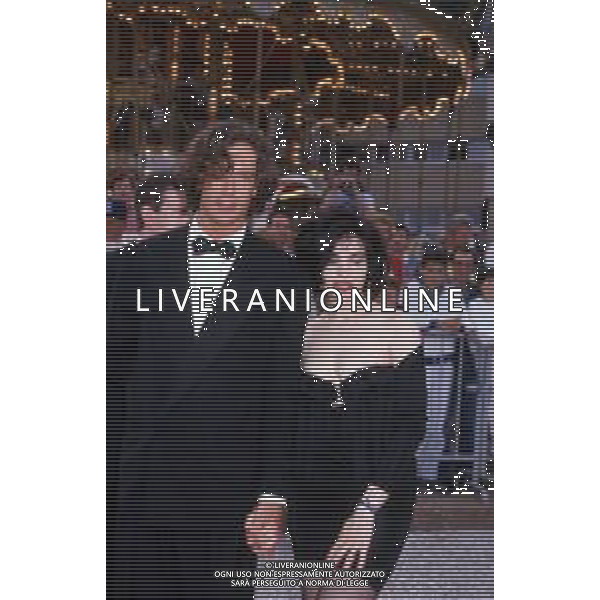 DIAP-RETROSPETTIVA RUPERT EVERETT ATTORE NELLA FOTO RUPERT EVERETT E BEATRICE DALLE A CANNES NELL\'ANNO 1988 AG ALDO LIVERANI SAS