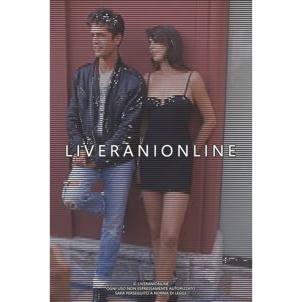 DIAP-RETROSPETTIVA RUPERT EVERETT ATTORE NELLA FOTO RUPERT EVERETT CON ANNABEL BROOKS A VENEZIA ANNO 1987 AG ALDO LIVERANI SAS  