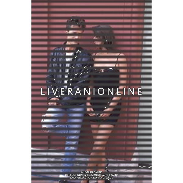 DIAP-RETROSPETTIVA RUPERT EVERETT ATTORE NELLA FOTO RUPERT EVERETT CON ANNABEL BROOKS A VENEZIA ANNO 1987 AG ALDO LIVERANI SAS  