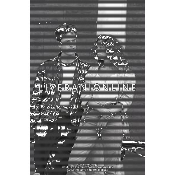 NEG-RETROSPETTIVA RUPERT EVERETT ATTORE NELLA FOTO RUPERT EVERETT CON VALERIA GOLINO A VENEZIA NELL\'ANNO 1987 AG ALDO LIVERANI SAS