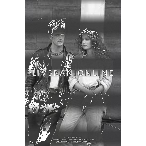 NEG-RETROSPETTIVA RUPERT EVERETT ATTORE NELLA FOTO RUPERT EVERETT CON VALERIA GOLINO A VENEZIA NELL\'ANNO 1987 AG ALDO LIVERANI SAS