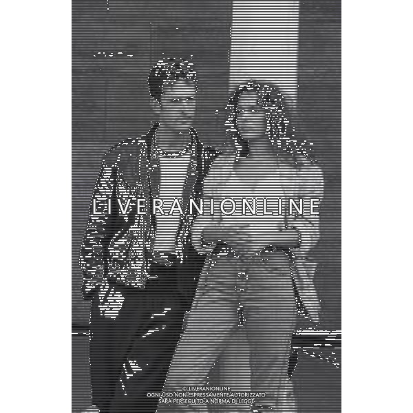 NEG-RETROSPETTIVA RUPERT EVERETT ATTORE NELLA FOTO RUPERT EVERETT CON VALERIA GOLINO A VENEZIA NELL\'ANNO 1987 AG ALDO LIVERANI SAS