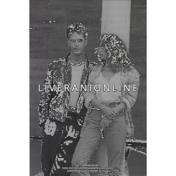 NEG-RETROSPETTIVA RUPERT EVERETT ATTORE NELLA FOTO RUPERT EVERETT CON VALERIA GOLINO A VENEZIA NELL\'ANNO 1987 AG ALDO LIVERANI SAS