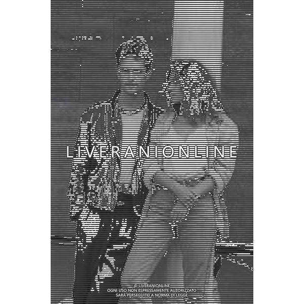 NEG-RETROSPETTIVA RUPERT EVERETT ATTORE NELLA FOTO RUPERT EVERETT CON VALERIA GOLINO A VENEZIA NELL\'ANNO 1987 AG ALDO LIVERANI SAS