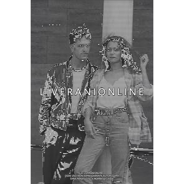 NEG-RETROSPETTIVA RUPERT EVERETT ATTORE NELLA FOTO RUPERT EVERETT CON VALERIA GOLINO A VENEZIA NELL\'ANNO 1987 AG ALDO LIVERANI SAS