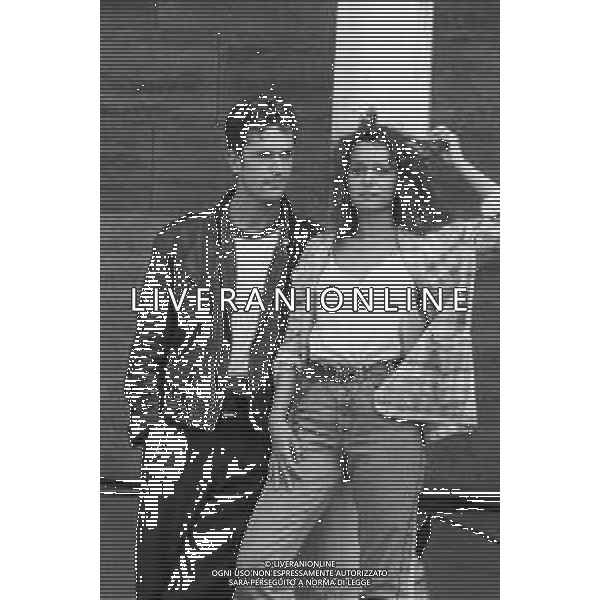 NEG-RETROSPETTIVA RUPERT EVERETT ATTORE NELLA FOTO RUPERT EVERETT CON VALERIA GOLINO A VENEZIA NELL\'ANNO 1987 AG ALDO LIVERANI SAS