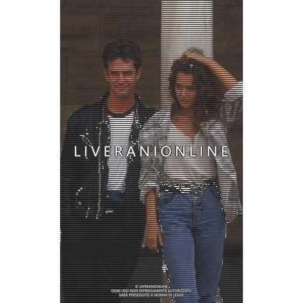 DIAP-RETROSPETTIVA RUPERT EVERETT ATTORE NELLA FOTO RUPERT EVERETT CON VALERIA GOLINO A VENEZIA NELL\'ANNO 1987 AG ALDO LIVERANI SAS