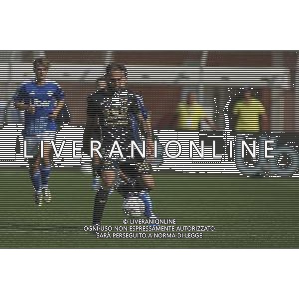 Grigoris Kastanos of Hellas Verona FC play the ball during Como 1907 FC vs Hellas Verona FC, 6° Serie A Enilive 2024-25 game at G. Sinigaglia stadium in Como (CO), Italy, on September 29, 2024. (Photo by Davide Casentini)/ AGENZIA ALDO LIVERANI SAS
