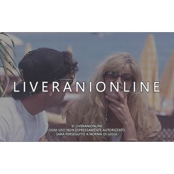DIAP-RETROSPETTIVA RUPERT EVERETT ATTORE NELLA FOTO RUPERT EVERETT E NATASHA RICHARDSON A CANNES NELL\'ANNO 1990 AG ALDO LIVERANI SAS