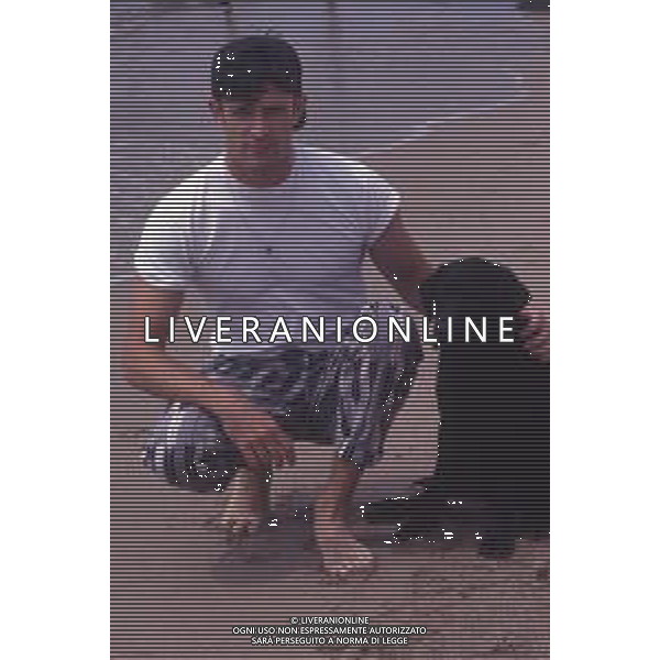 DIAP-RETROSPETTIVA RUPERT EVERETT ATTORE NELLA FOTO RUPERT EVERETT A CANNES NELL\'ANNO 1990 AG ALDO LIVERANI SAS
