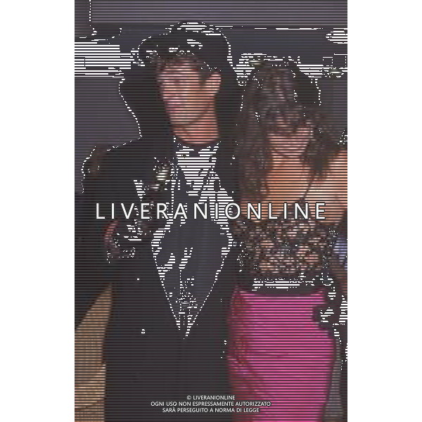 DIAP-RETROSPETTIVA RUPERT EVERETT ATTORE NELLA FOTO RUPERT EVERETT CON ANNBEL BROOKS A VENEZIA NELL\'ANNO 1987 AG ALDO LIVERANI SAS