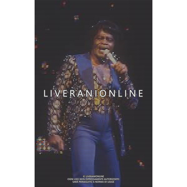DIAP-RETROSPETTIVA JAMES BROWN CANTANTE NELLA FOTO JAMES BROWN A MILANO NELL\'ANNO 1986 OSPITE DI MIKE BONGIORNO AG ALDO LIVERANI SAS