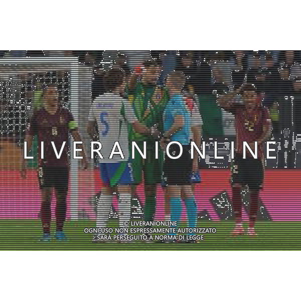 TVEM October 10, 2024 in Roma, Italy. Italy vs Belgium, UEFA Nations League 2024/25 League A Group A2 match - Olympic Stadium. In the pic: the referee Espen Eskas of Norway, Gianluigi Donnarumma, Riccardo Calafiori ©Emmanuele Matrodonato/AGENZIA ALDO LIVERANI SAS