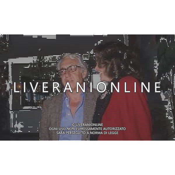 DIA- RETROSPETTIVA GIUSEPPE PATRONI GRIFFI REGISTA NELLA FOTO GIUSEPPE PATRONI GRIFFI NELL\'ANNO 1986 CON FLORINDA BOLKAN A MILANO TERRAZZA MARTINI AG ALDO LIVERANI SAS
