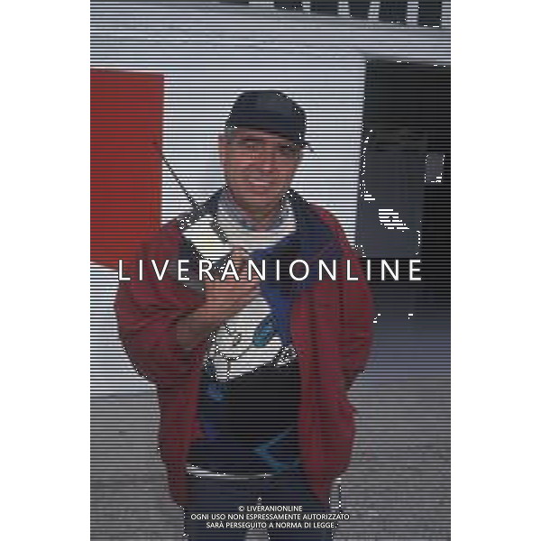 DIA- RETROSPETTIVA EZIO ZERMIANI GIORNALISTA SPORTIVO NELLA FOTO EZIO ZERMIANI AL GP DI F1 DI SAN MARINO NELL’ANNO 1993 AG ALDO LIVERANI SAS