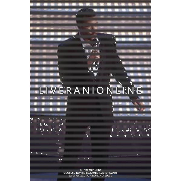 DIA- RETROSPETTIVA LIONEL RICHIE CANTANTE NELLA FOTO LIONEL RICHIE OSPITE AL FESTIVAL DI SANREMO NELL’ANNO 1997 AG ALDO LIVERANI SAS