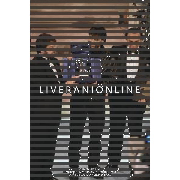 DIAP-RETROSPETTIVA ANDREA BOCELLI CANTANTE NELLA FOTO ANDREA BOCELLI AL FESTIVAL DI SANREMO GIOVANI NELL\'ANNO 1994 CON PIPPO BAUDO AG ALDO LIVERANI SAS  
