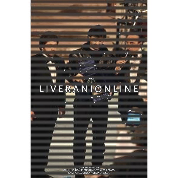 DIAP-RETROSPETTIVA ANDREA BOCELLI CANTANTE NELLA FOTO ANDREA BOCELLI AL FESTIVAL DI SANREMO GIOVANI NELL\'ANNO 1994 CON PIPPO BAUDO AG ALDO LIVERANI SAS 