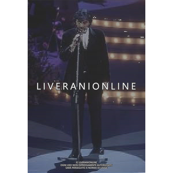 DIAP-RETROSPETTIVA ANDREA BOCELLI CANTANTE NELLA FOTO ANDREA BOCELLI AL FESTIVAL DI SANREMO NELL\'ANNO 1995  AG ALDO LIVERANI SAS