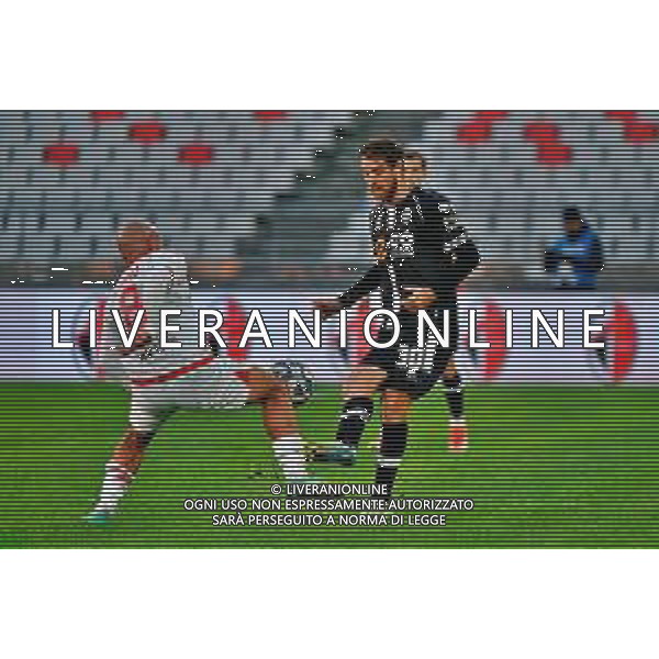 December 07, 2024 Bari, Italy - SSC Bari vs Cesena FC - Italian soccer serie B 2024/25 - San Nicola Stadium. In the pic: Simone Bastoni of Cesena FC in action against Ahmad Benali of SSC Bari ©Emmanuele Mastrodonato - AGENZIA ALDO LIVERANI SAS