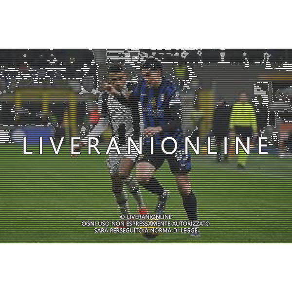 Inter vs Udinese nella foto Rui Modesto (Udinese) e Alessandro Bastoni (Inter) Milano 19-12-2024 Stadio Giuseppe Meazza - San Siro Coppa Italia Frecciarossa - ottavi di finale foto Roberto Garavaglia/Agenzia Aldo Liverani sas-AGENZIA ALDO LIVERANI SAS