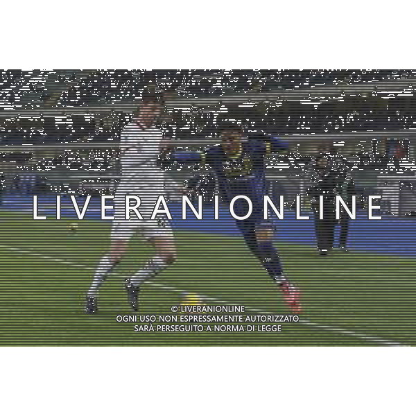 Matteo Gabbia of AC Milan battle for the ball with Amin Sarr of Hellas Verona FC during Hellas Verona FC vs AC Milan, 17° Serie A Enilive 2024-25 game at Marcantonio Bentegodi stadium in Verona (VR), Italy, on Dicember 20, 2024. (Photo by Davide Casentini)-AGENZIA ALDO LIVERANI SAS
