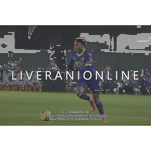 Amin Sarr of Hellas Verona FC play the ball during Hellas Verona FC vs AC Milan, 17° Serie A Enilive 2024-25 game at Marcantonio Bentegodi stadium in Verona (VR), Italy, on Dicember 20, 2024. (Photo by Davide Casentini)-AGENZIA ALDO LIVERANI SAS