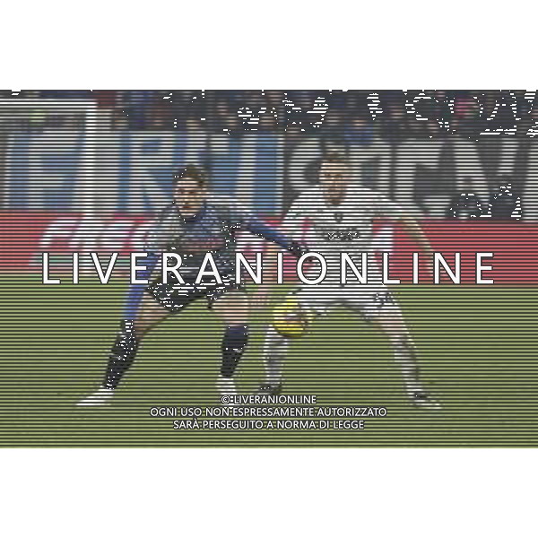Nicolo’ Zaniolo of Atalanta BC battle for the ball with Ardian Ismajli of Empoli FC during Atalanta BC vs Empoli FC, 17° Serie A Enilive 2024-25 game at Gewiss stadium in Bergamo (BG), Italy, on Dicember 22, 2024. (Photo by Davide Casentini)-AGENZIA ALDO LIVERANI SAS
