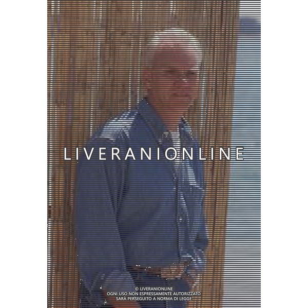 DIAP-RETROSPETTIVA MALCOM MCDOWELL ATTORE NELLA FOTO MALCOM MCDOWELL A CANNES NELL\'ANNO 1991 AG ALDO LIVERANI SAS