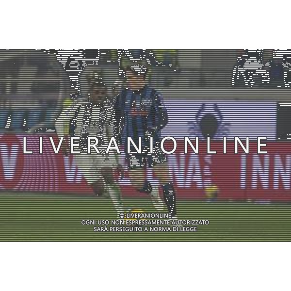 Nicolo’ Zaniolo of Atalanta BC battle for the ball with Pierre Kalulu of Juventus FC during Atalanta BC vs Juventus FC, 19° Serie A Enilive 2024-25 game at Gewiss stadium in Bergamo (BG), Italy, on January 14, 2025. (Photo by Davide Casentini)-AGENZIA ALDO LIVERANI SAS