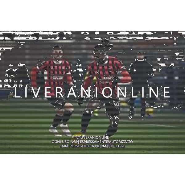 Como vs Milan nella foto Rafael Leao (Milan) e sulla SX Theo Hernandez (Milan) Como 14-01-2025 Stadio Giuseppe Sinigaglia Campionato Serie A Enilive - recupero 19a giornata foto Roberto Garavaglia/Agenzia Aldo Liverani sas