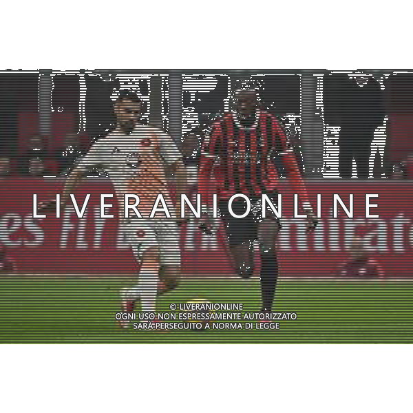 Milan vs Roma nella foto Mehmet Zeki Celik (Roma) e Tammy Abraham (Milan) Milano 05-02-2025 Stadio Giuseppe Meazza - San Siro Coppa Italia Frecciarossa - quarti di finale foto Roberto Garavaglia/Agenzia Aldo Liverani sas- AGENZIA ALDO LIVERANI SAS
